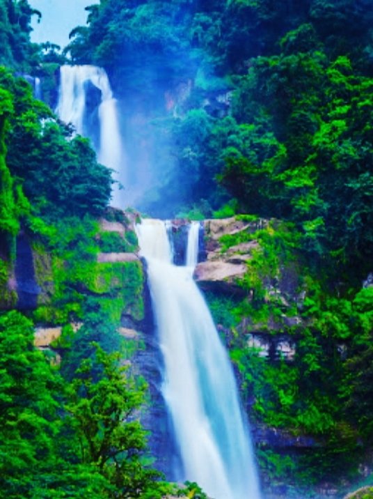 A jungle waterfall in the hills of Flores