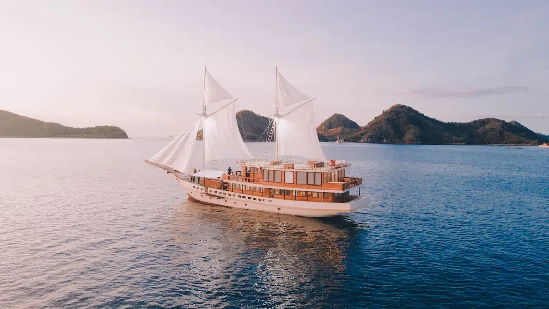 Phinisi at golden hour in Komodo National Park