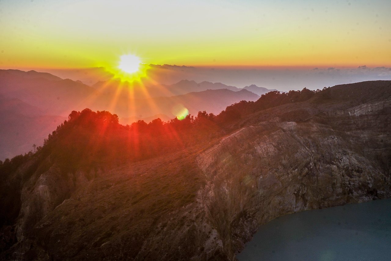 Sunrise over the crater lakes of Kelimutu, Flores