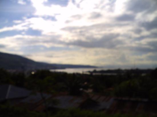 A calm lake backed by hills in the Banggai region, Central Sulawesi