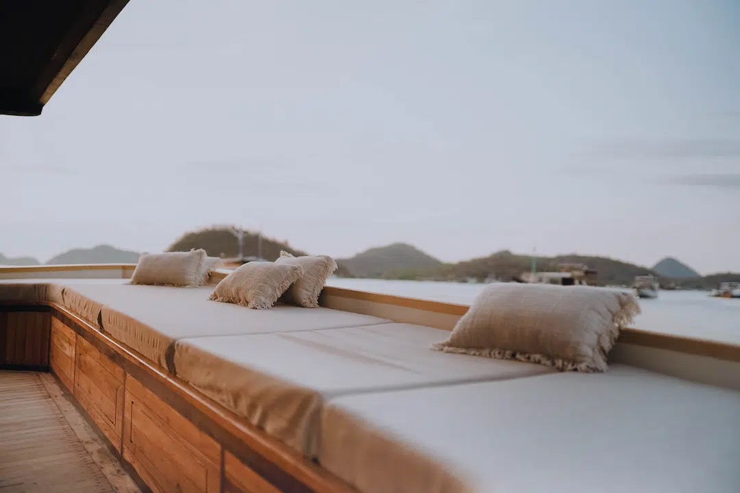 Outdoor deck and seating aboard the Phinisi