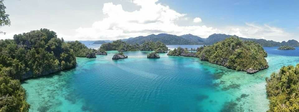 Turquoise water among the karst islands of Sombori, Southeast Sulawesi