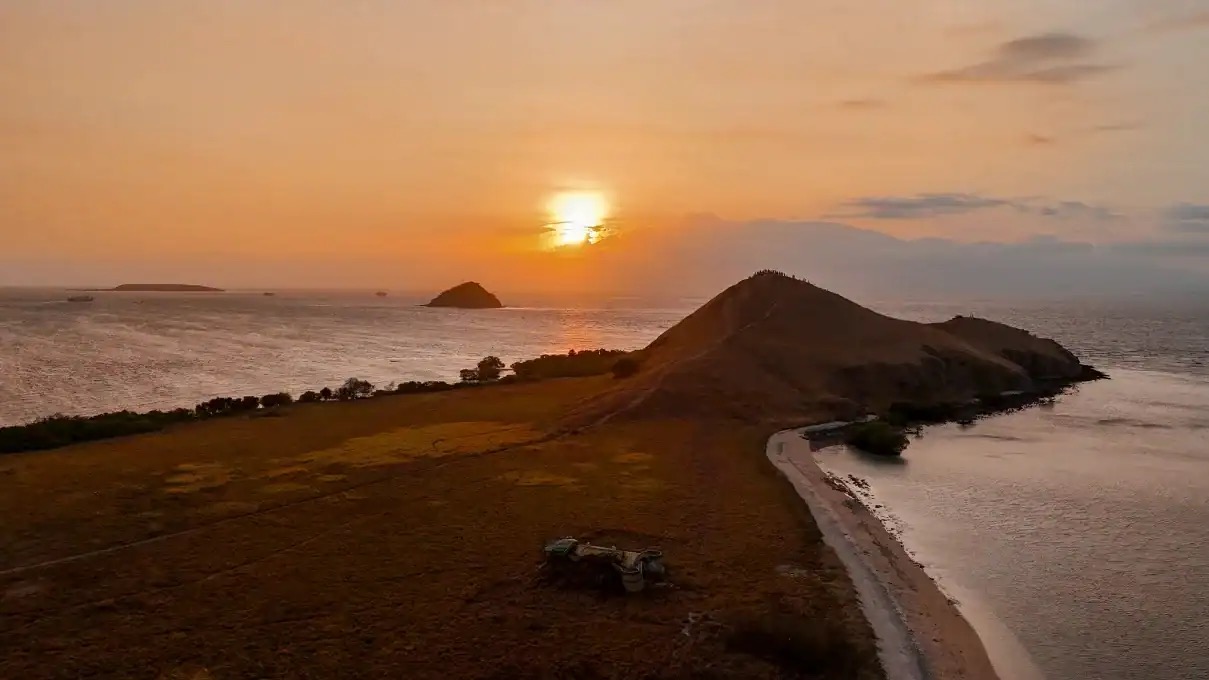 Sunset over a headland and bay in Sumbawa, West Nusa Tenggara