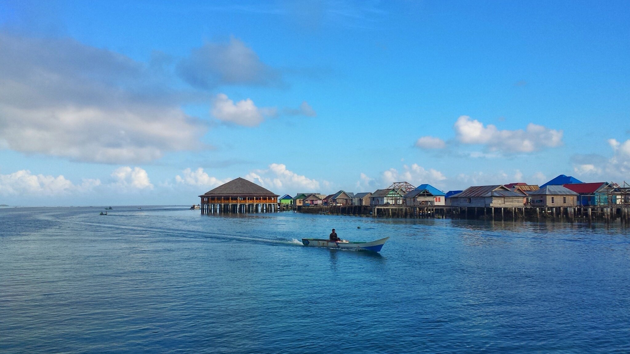 Overwater bungalows above the reef at Wakatobi, Southeast Sulawesi
